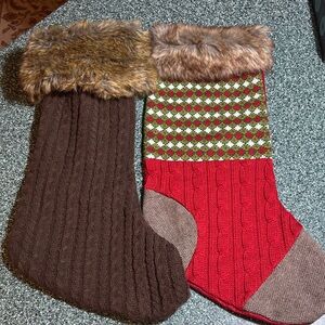 Two Cable Knit Christmas Stockings With Faux Fur Cuffs.